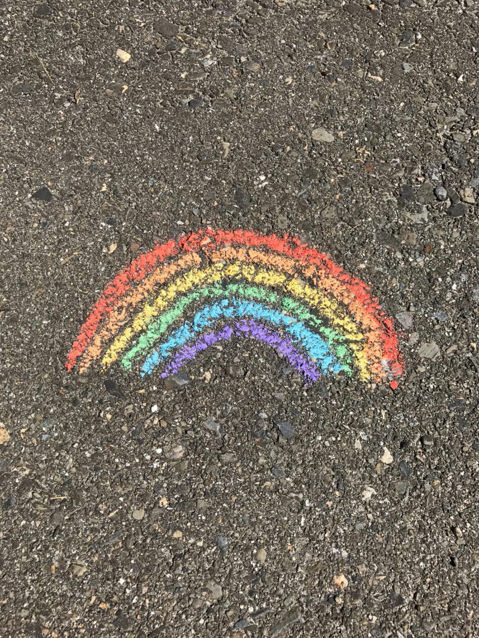 Chalk rainbow drawn on concrete