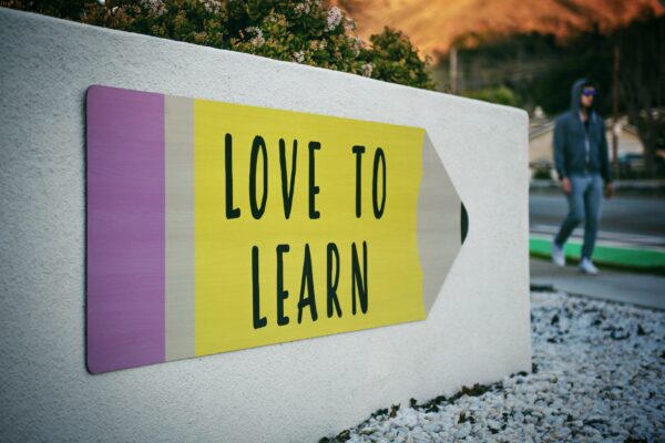 Pencil that says "Love to Learn" on it